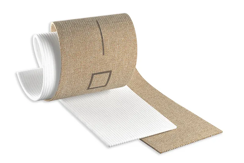 CPK COMPRESS-2 - Produktvisualisierung der Polsterbinde und des elastischen, kohäsiven Verband